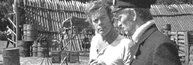 Doug McClure and John McEnery star in THE LAND THAT TIME FORGOT, directed by Kevin Connor for American International Pictures.