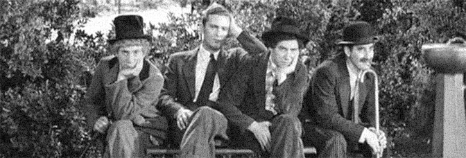 Harpo Marx, Allan Jones, Chico Marx, and Groucho Marx star in A NIGHT AT THE OPERA, directed by Sam Wood for Metro-Goldwyn-Mayer.